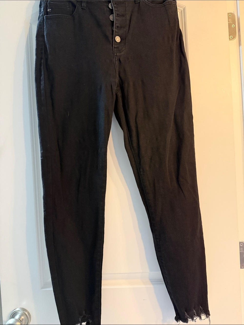 KanCan black skinny style jeans with frayed ends